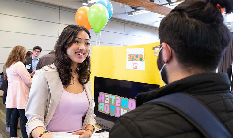 A student presents at the Social Venture Plan Competition