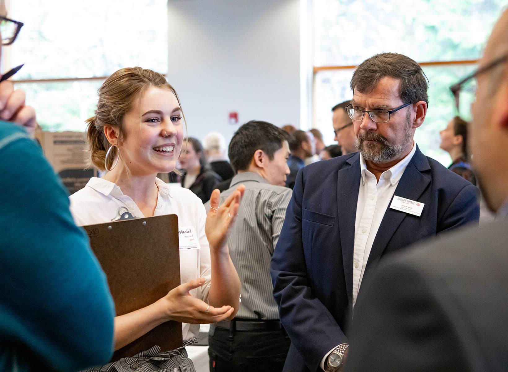 An SPU business student networks with local employers | photo by Lynn Anselmi